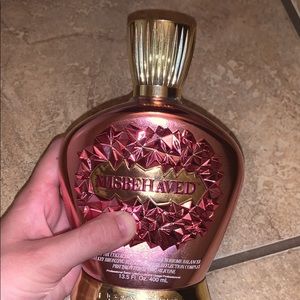 Misbehaved tanning lotion designer skin bronzer